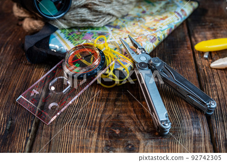 Map, compass and pliers. Orientation and location. Location search. Map, compass and pliers. Orientation and location. Location search. 92742305