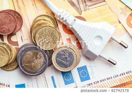 Energy savings concept with power plug and euro money Energy savings concept with power plug and euro money 92742578