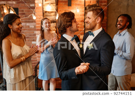 Loving Gay Couple Dancing in Wedding Loving Gay Couple Dancing in Wedding 92744151