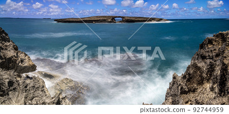 laie sea arch and rocky cliff beach in oahu hawaii 92744959