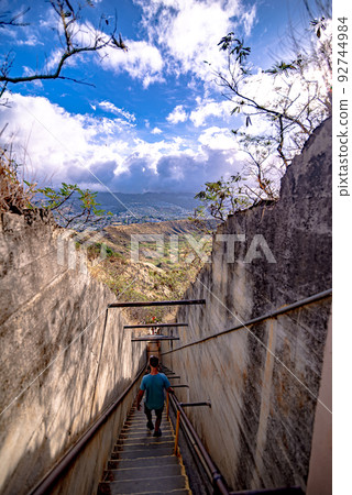 walking down a stair at diamond head state park in oahu hawaii 92744984