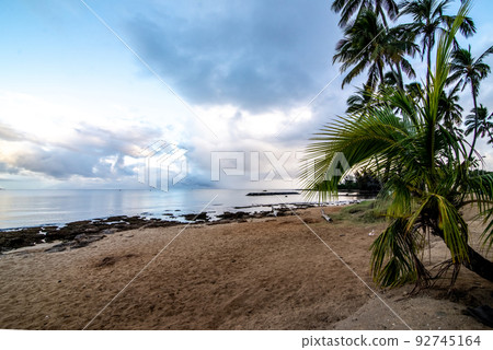 View of park and tropical beach in Haleiwa, North shore of Oahu, Hawaii View of park and tropical beach in Haleiwa, North shore of Oahu, Hawaii 92745164