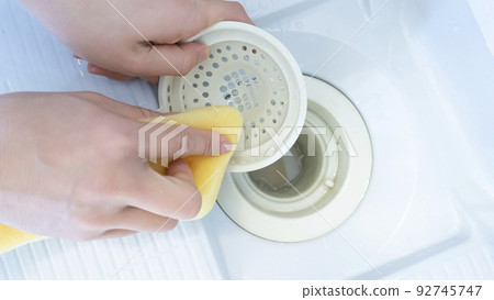 Cleaning the bathroom drain Cleaning the bathroom drain 92745747