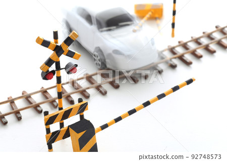 A car that ignores the railroad crossing and enters the track A car that ignores the railroad crossing and enters the track 92748573