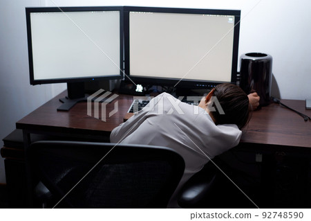 woman working until midnight 92748590