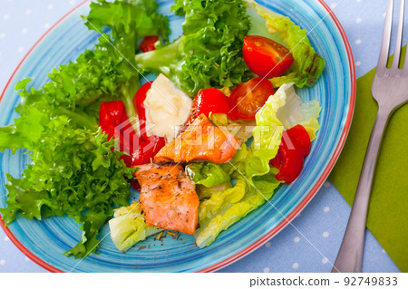 Grilled trout with vegetables 92749833