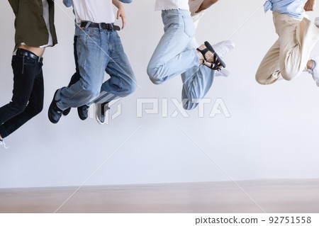 Young men and women Jump 92751558