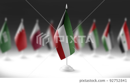 The national flag of the Kuwait on the background of flags of other countries The national flag of the Kuwait on the background of flags of other countries 92752841