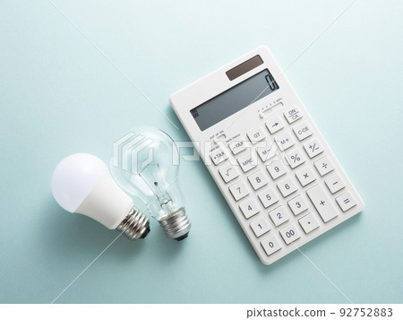 Incandescent light bulb and LED bulb and calculator Incandescent light bulb and LED bulb and calculator 92752883