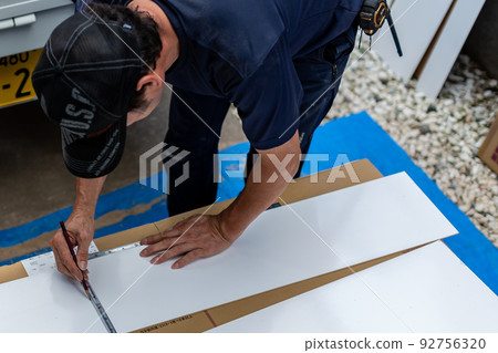 A craftsman who cuts a board Carpenter A craftsman who cuts a board Carpenter 92756320