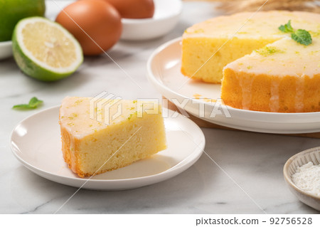 Delicious Lemon Glazed Pound Sponge cake on white marble table background. 92756528