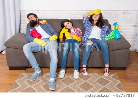 Tired family. exhausted family after cleaning house. tired Tired family. exhausted family after cleaning house. tired 92757817