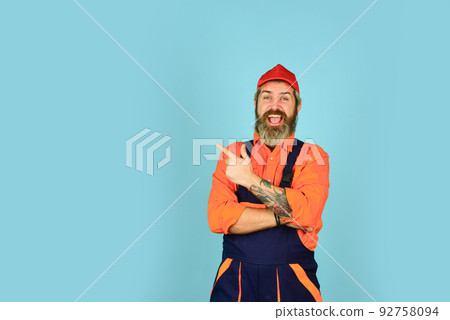 builder in working overalls. Engineer and industrial building. builder in working overalls. Engineer and industrial building. 92758094