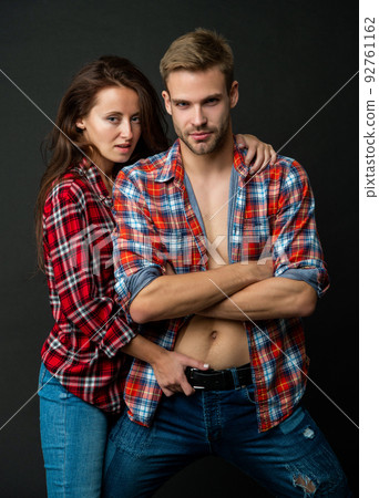 sexual young couple in love on black background, love 92761162