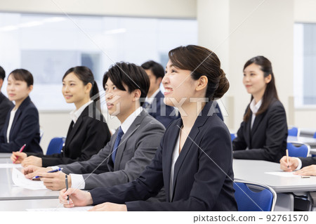 Business person receiving training 92761570