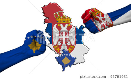 Serbia vs Republic of Kosovo. Two fists with national flags for military conflict, in the middle the geographical map of the two countries, on a white background 92761981