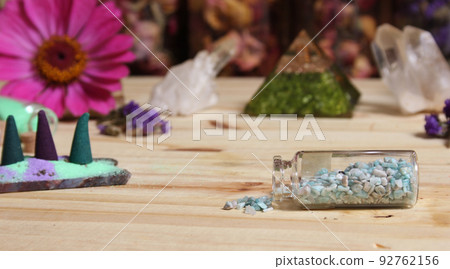 Incense Cones on Stone Slab With Crystals and Flowers Incense Cones on Stone Slab With Crystals and Flowers 92762156