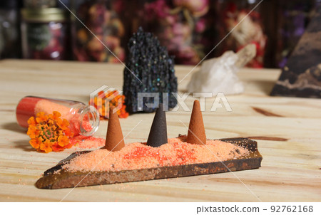 Rock Crystal With Incense and Stone Pyramid on Meditation Altar 92762168