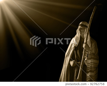 Ancient man with wooden wand 92762758