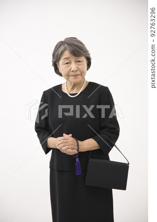 senior woman in mourning clothes 92763296