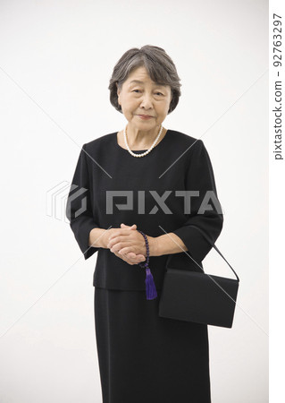 senior woman in mourning clothes 92763297