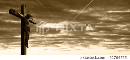 Crucified Christ hangs on the cross 92764735