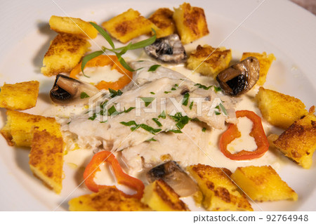Recipe for sea bass fillet with fried polenta and white wine sauce Recipe for sea bass fillet with fried polenta and white wine sauce 92764948