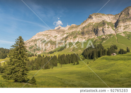 Idyllic mountain landscape in the Swiss Alps with Alpstein and Saentis mountain peak, Switzerland Idyllic mountain landscape in the Swiss Alps with Alpstein and Saentis mountain peak, Switzerland 92765283