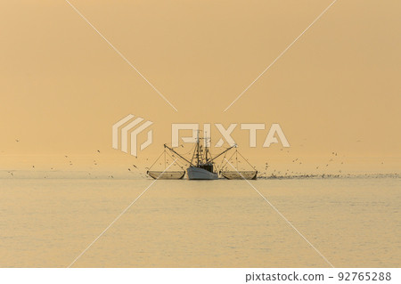Fishing boat with trawl net Fishing boat with trawl net 92765288