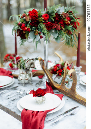 Winter Wedding decor with red roses Winter Wedding decor with red roses 92765385