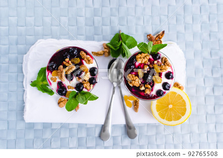 cream dessert with black currants and nuts cream dessert with black currants and nuts 92765508