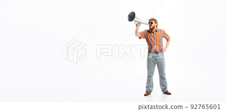 Portrait of young man dressed in 50s, 60s fashion style outfit posing isolated on white background. Retro vintage style, ad, emotions and facial expressions Portrait of young man dressed in 50s, 60s fashion style outfit posing isolated on white background. Retro vintage style, ad, emotions and facial expressions 92765601