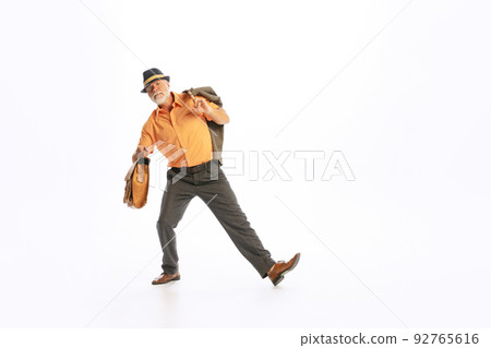 Portrait of emotional senior man in retro style clothes, vintage outfit posng isolated on white background. Concept of culture, art, music, fashion style, ad Portrait of emotional senior man in retro style clothes, vintage outfit posng isolated on white background. Concept of culture, art, music, fashion style, ad 92765616