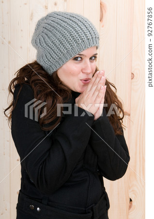 ery cold woman in a cabin in autumn or winter ery cold woman in a cabin in autumn or winter 92767856