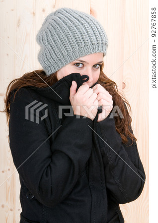 ery cold woman in a cabin in autumn or winter ery cold woman in a cabin in autumn or winter 92767858