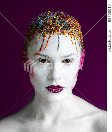 Portrait of a girl with a beaded hairstyle 92768019