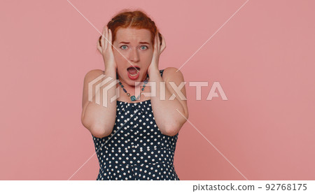 Scared fearful redhead woman meeting her phobia, evidence horror event, screaming, shouting at loud Scared fearful redhead woman meeting her phobia, evidence horror event, screaming, shouting at loud 92768175