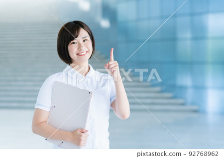 young nurse pointing young nurse pointing 92768962