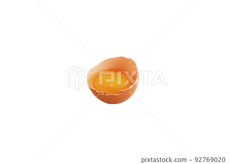 Broken chicken egg on a white background. 92769020