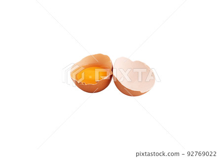 Broken chicken egg on a white background. 92769022
