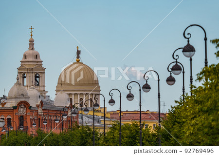 The Russian Venice, the Church of the Holy Great Martyr Catherine in Makarov Embankment, a lot of people during celebration of day of Navy, row of lampposts The Russian Venice, the Church of the Holy Great Martyr Catherine in Makarov Embankment, a lot of people during celebration of day of Navy, row of lampposts 92769496