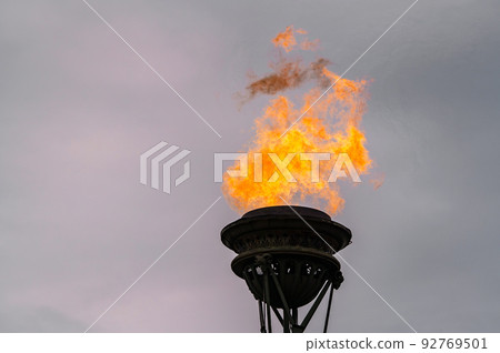 The fire of memory is lit on the rostral columns in St. Petersburg at the celebration of the day of the Russian Navy The fire of memory is lit on the rostral columns in St. Petersburg at the celebration of the day of the Russian Navy 92769501