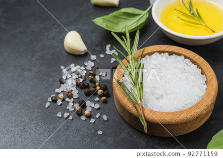Food background from vegetable, spices, herb on black table. 92771159
