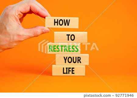 Restress your life symbol. Concept words How to restress your life on wooden blocks. Doctor hand. Beautiful orange background. Psychological business and restress your life concept. Copy space. Restress your life symbol. Concept words How to restress your life on wooden blocks. Doctor hand. Beautiful orange background. Psychological business and restress your life concept. Copy space. 92771946