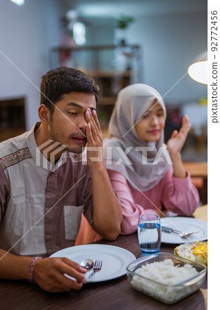 muslim couple having break fast or sahur in the morning muslim couple having break fast or sahur in the morning 92772456