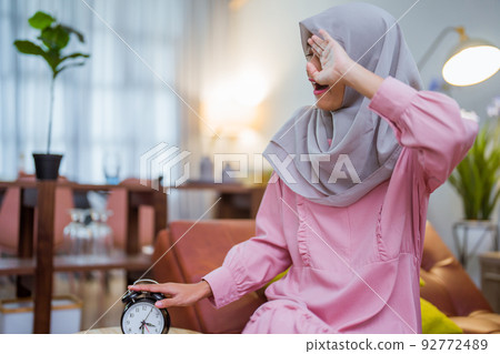 tired woman having break fast or sahur in the morning tired woman having break fast or sahur in the morning 92772489