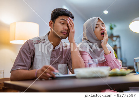 muslim couple having break fast or sahur in the morning muslim couple having break fast or sahur in the morning 92772597