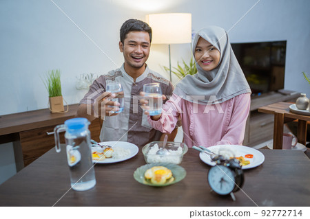 muslim couple having breakfast or sahur in the morning muslim couple having breakfast or sahur in the morning 92772714
