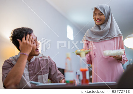 muslim couple having break fast or sahur in the morning muslim couple having break fast or sahur in the morning 92772718