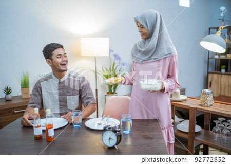 muslim couple having break fast or sahur in the morning muslim couple having break fast or sahur in the morning 92772852